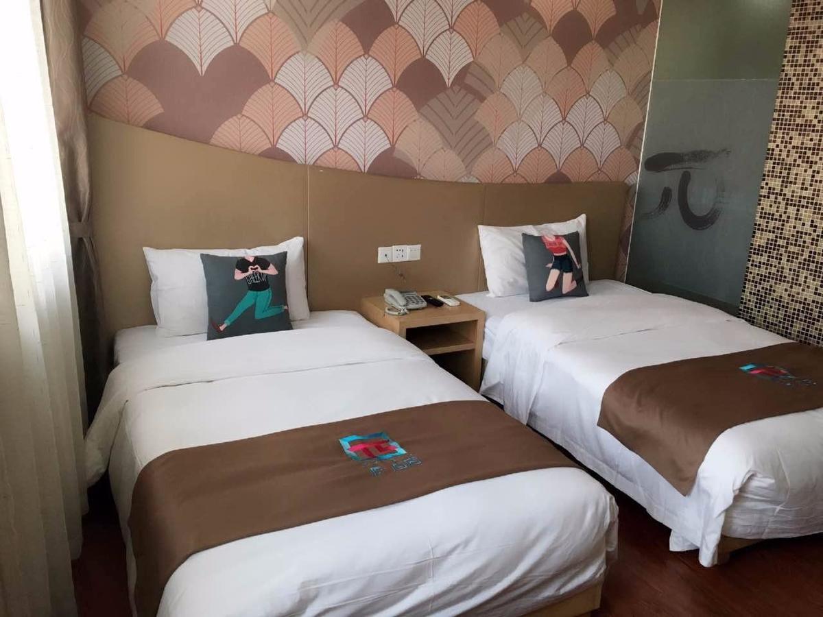 Pai Hotel Yuxi Tonghai Экстерьер фото